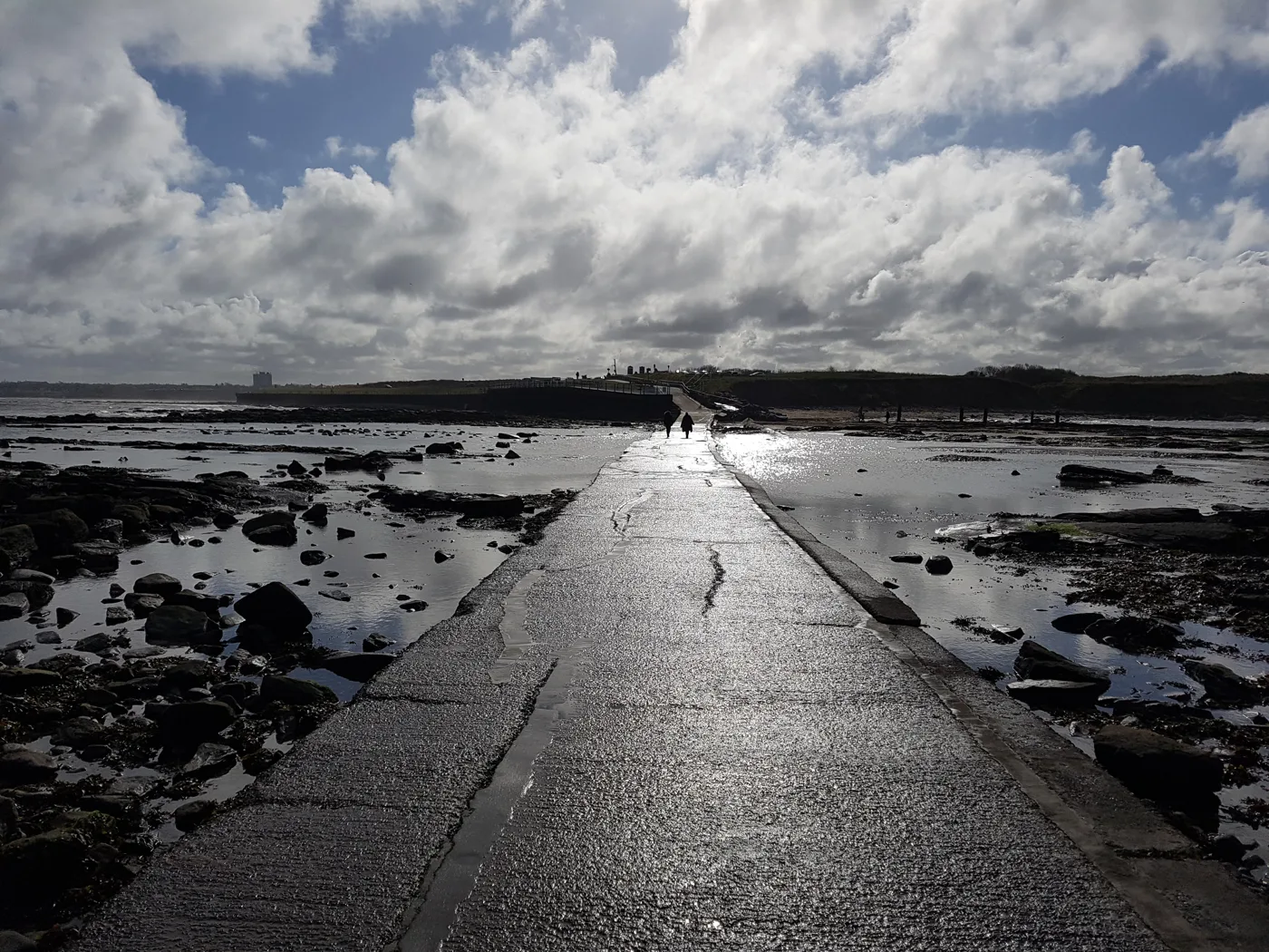 The concrete causeway to St Mary's Island at low tide, looking back towards the headland. The council says the 1960s structure is at the end of its life.